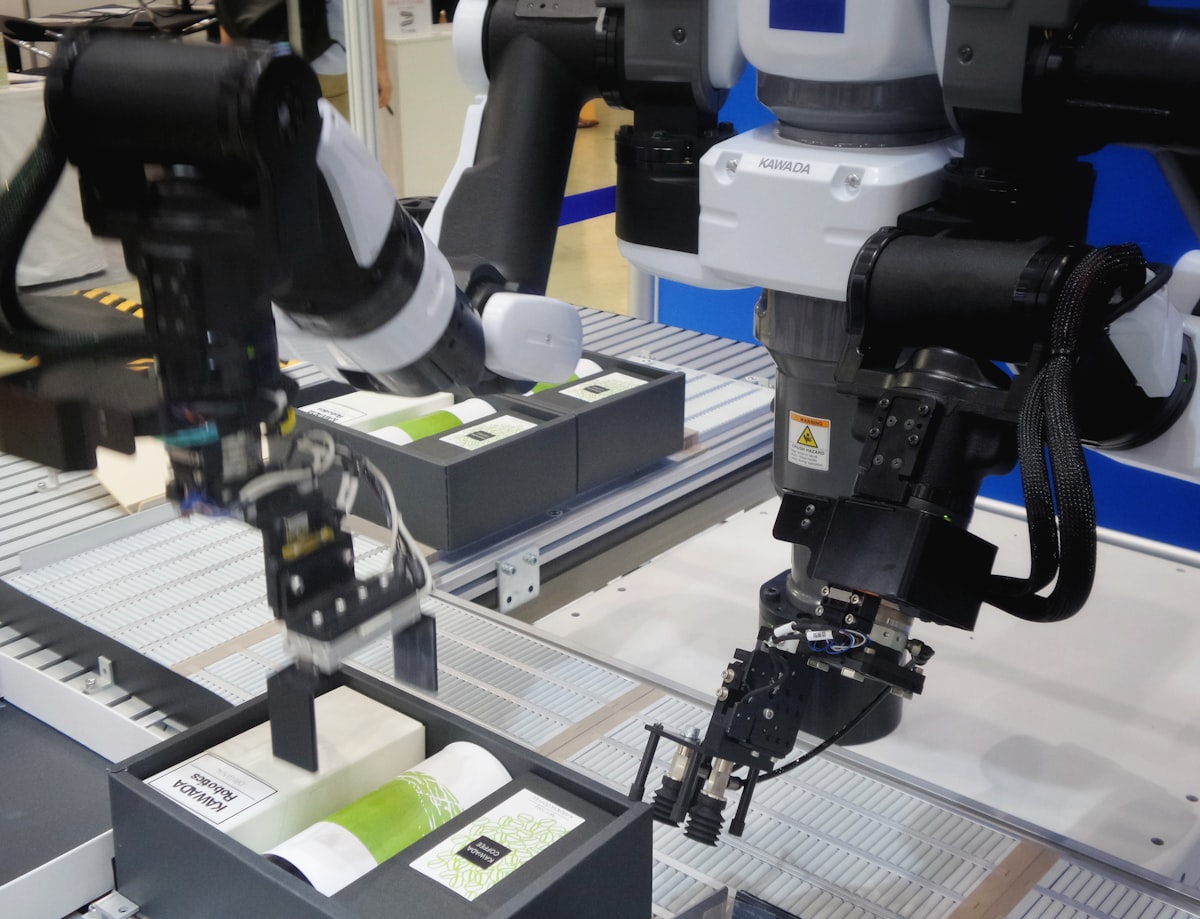 Robotic arms on a modern automated assembly line — industrial automation by M3A